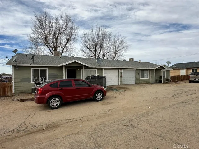 a car parked in front of a house