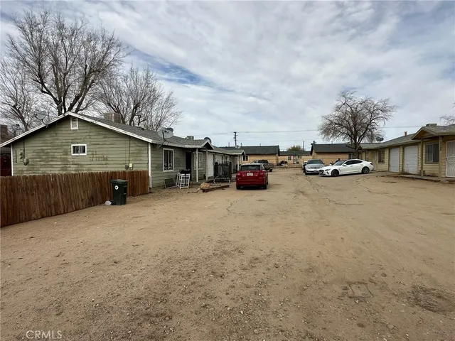 a view of car parked in front of house