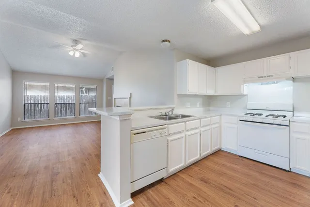 a view of livingroom with hardwood floor and window