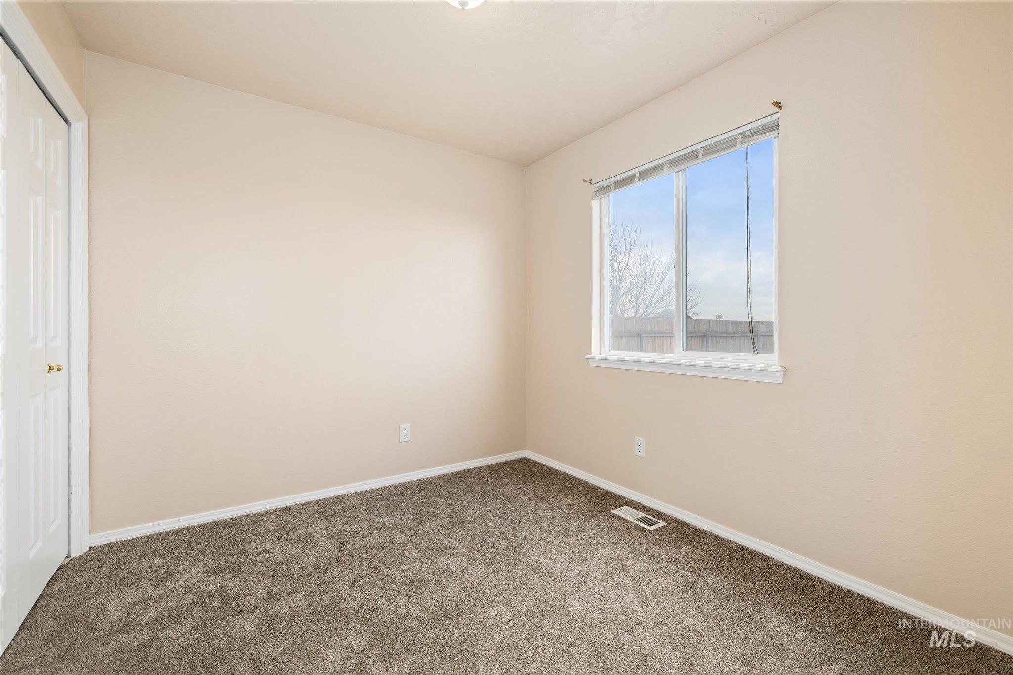 17925 Monarch Way Nampa, ID 83687 - Photo 18 of 29 Unfurnished bedroom featuring a closet and carpet floors