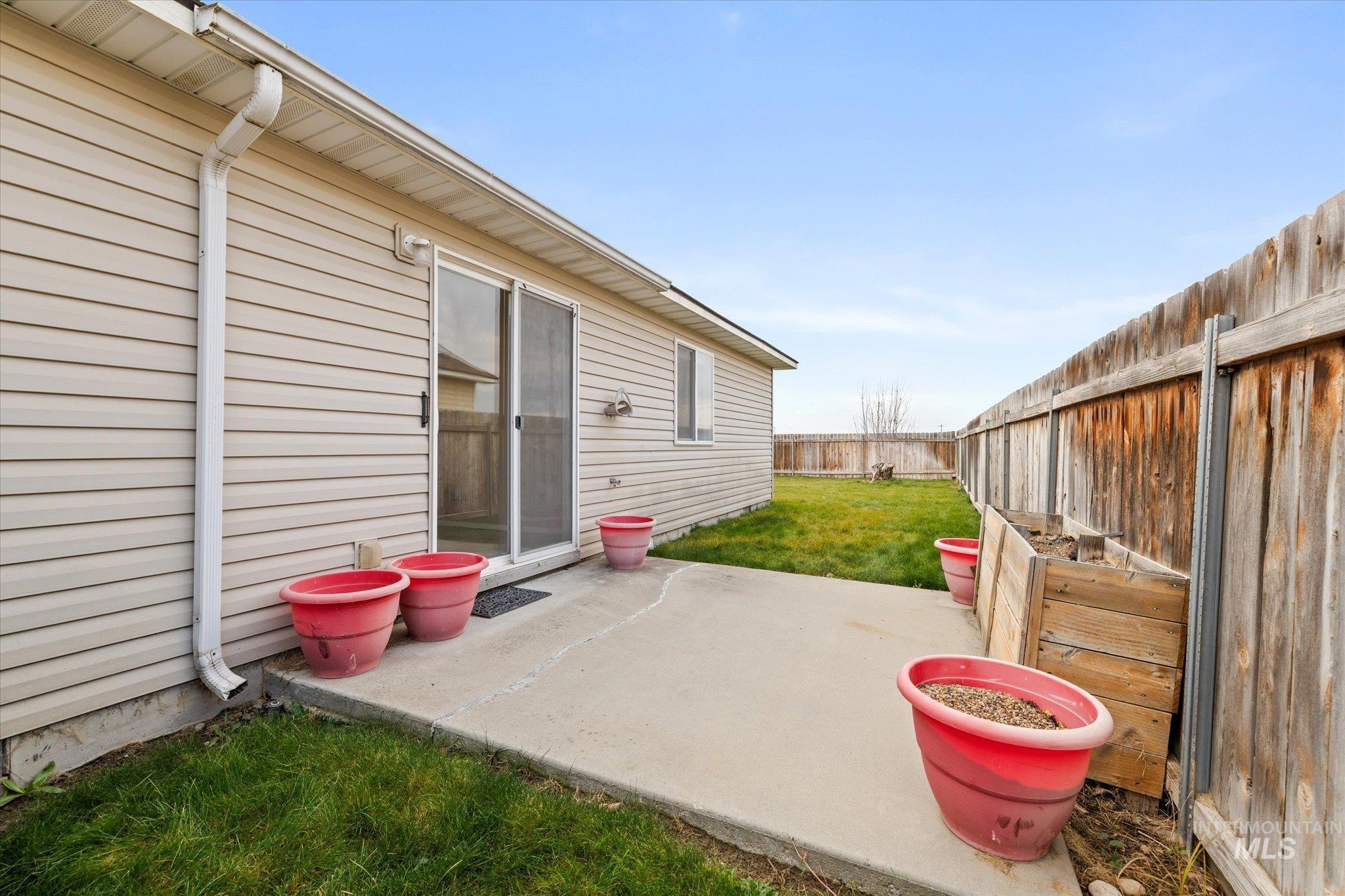 17925 Monarch Way Nampa, ID 83687 - Photo 23 of 29 Fenced backyard featuring a patio area