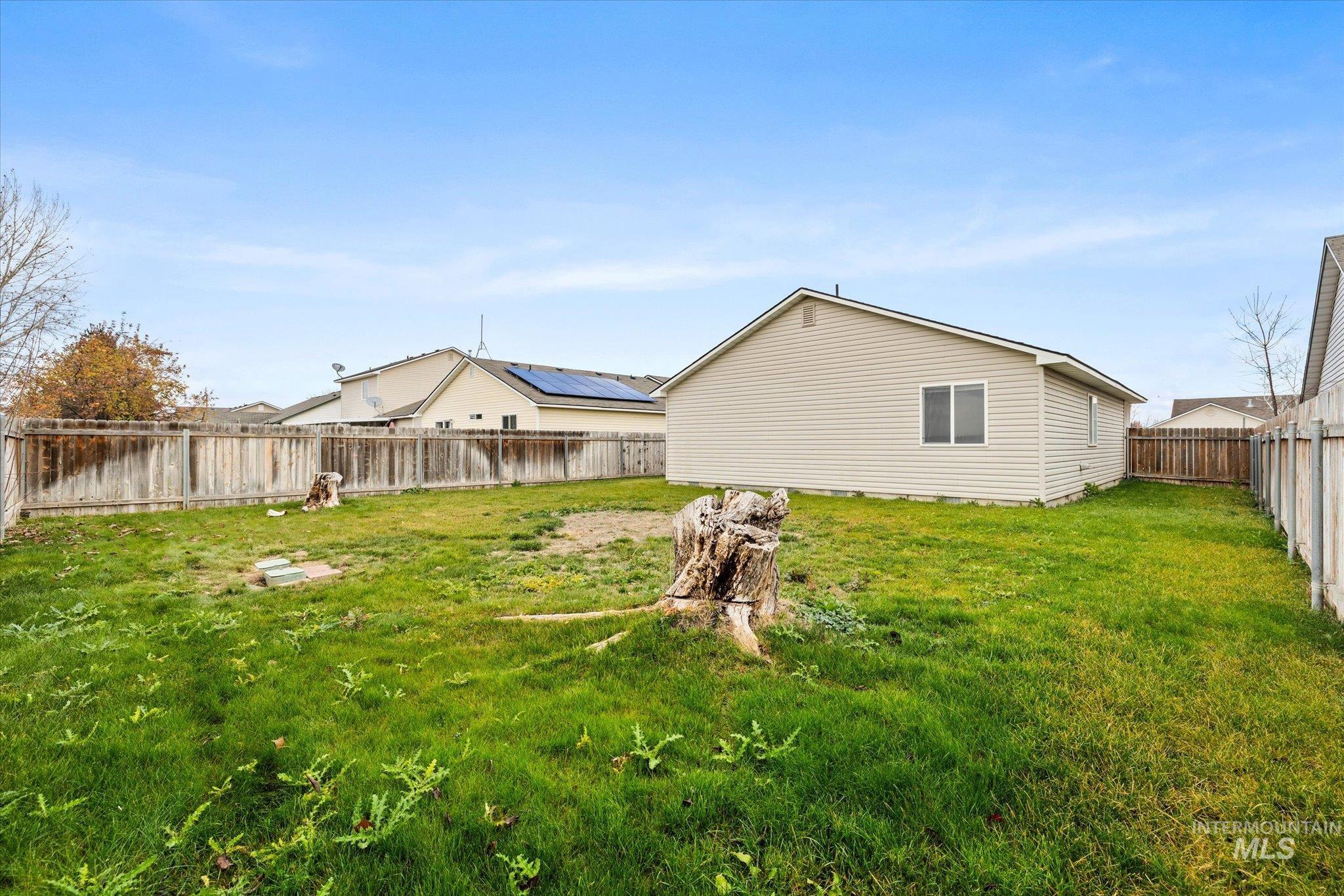 17925 Monarch Way Nampa, ID 83687 - Photo 26 of 29 Back of house with a fenced backyard