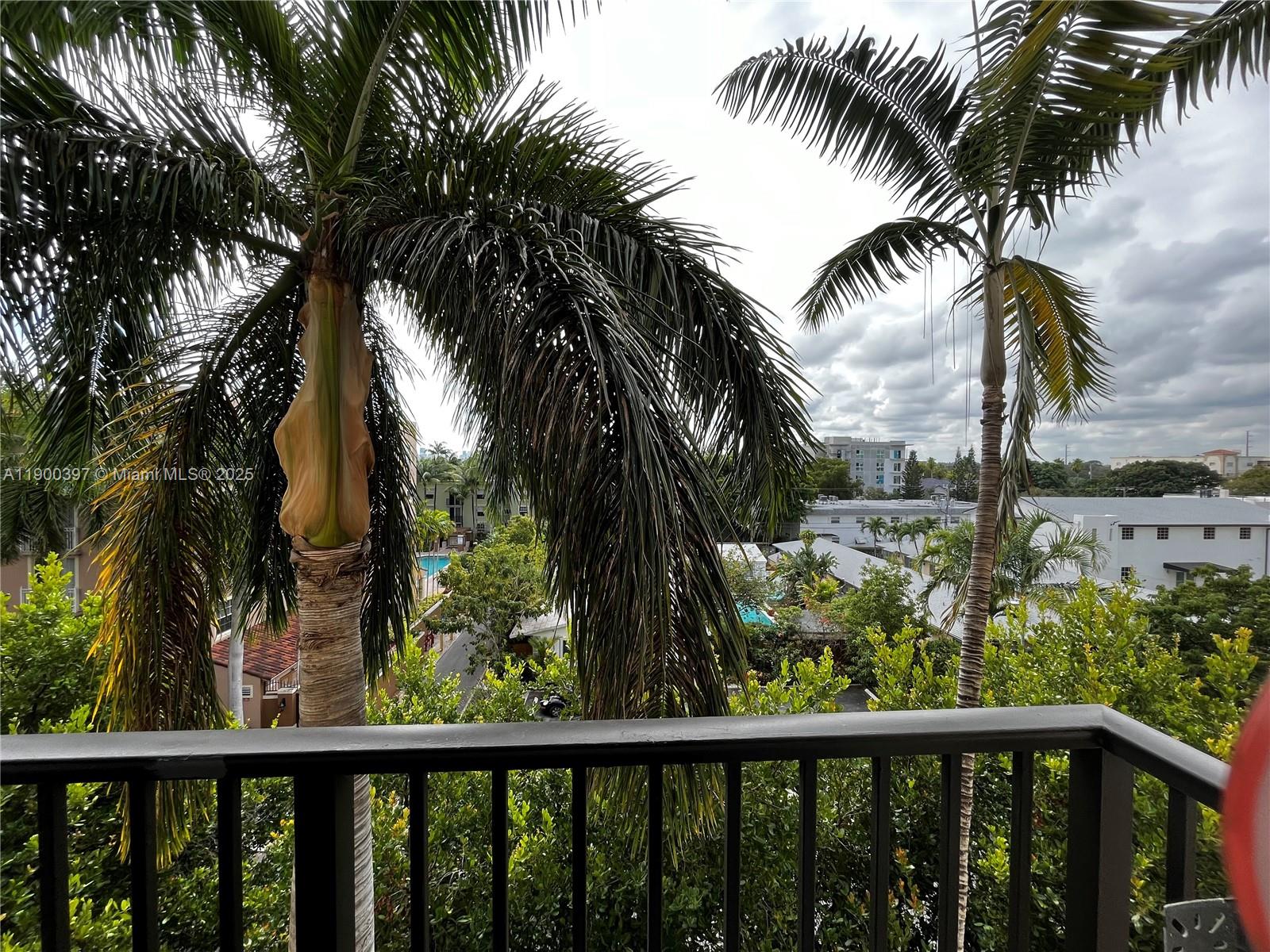 1919 Van Buren Street, Unit 507A Hollywood, FL 33020 - Photo 4 of 13 a view of outdoor space with trees