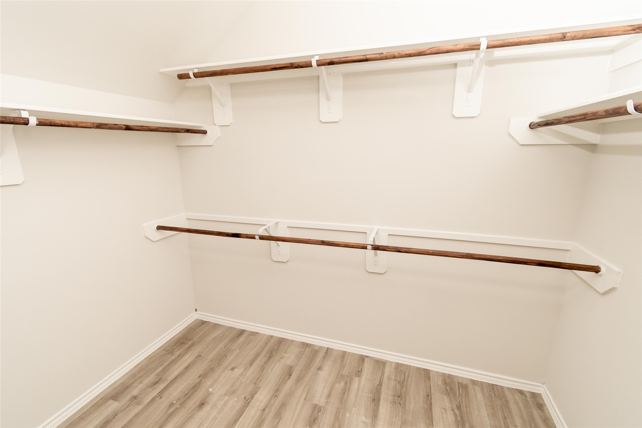 18638 Bell Ravine Drive Katy, TX 77449 - Photo 18 of 19 a view of a room with racks on the wall