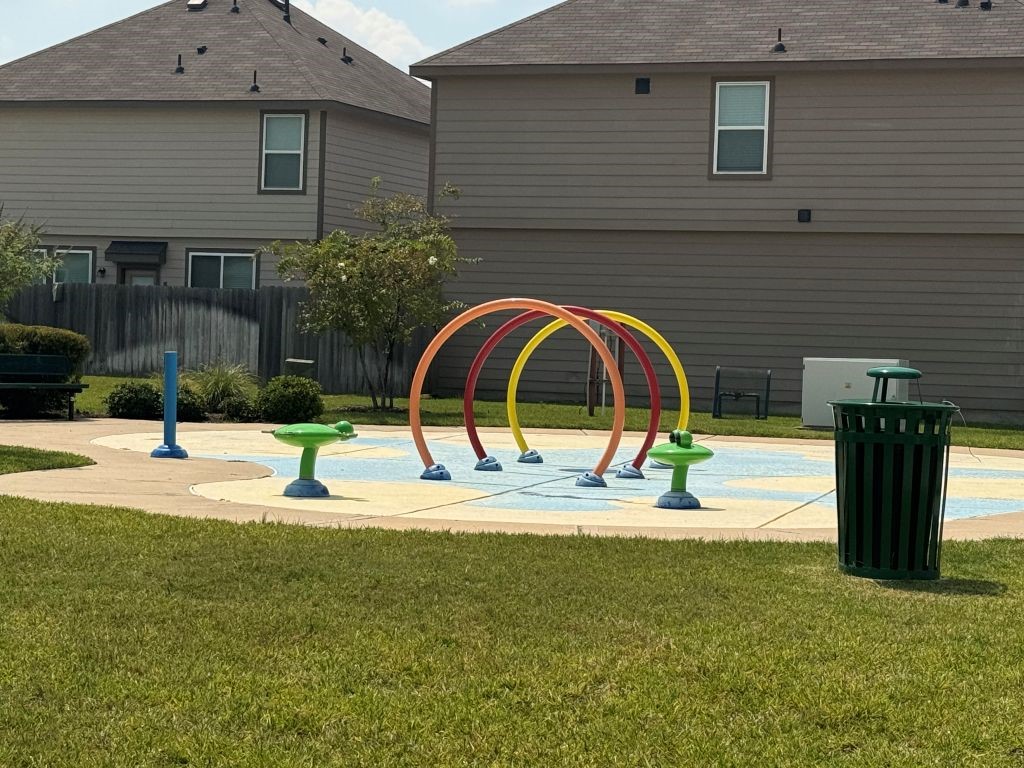 18638 Bell Ravine Drive Katy, TX 77449 - Photo 5 of 19 a house view with a swimming pool