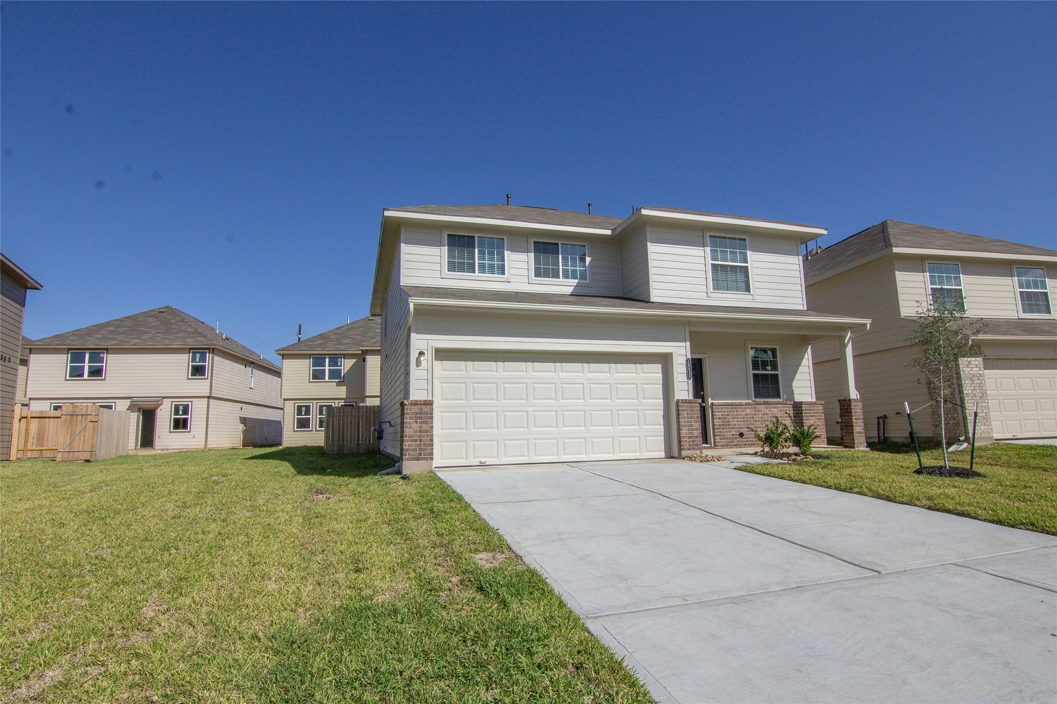 18638 Bell Ravine Drive Katy, TX 77449 - Photo 2 of 19 a front view of a house with a yard and garage