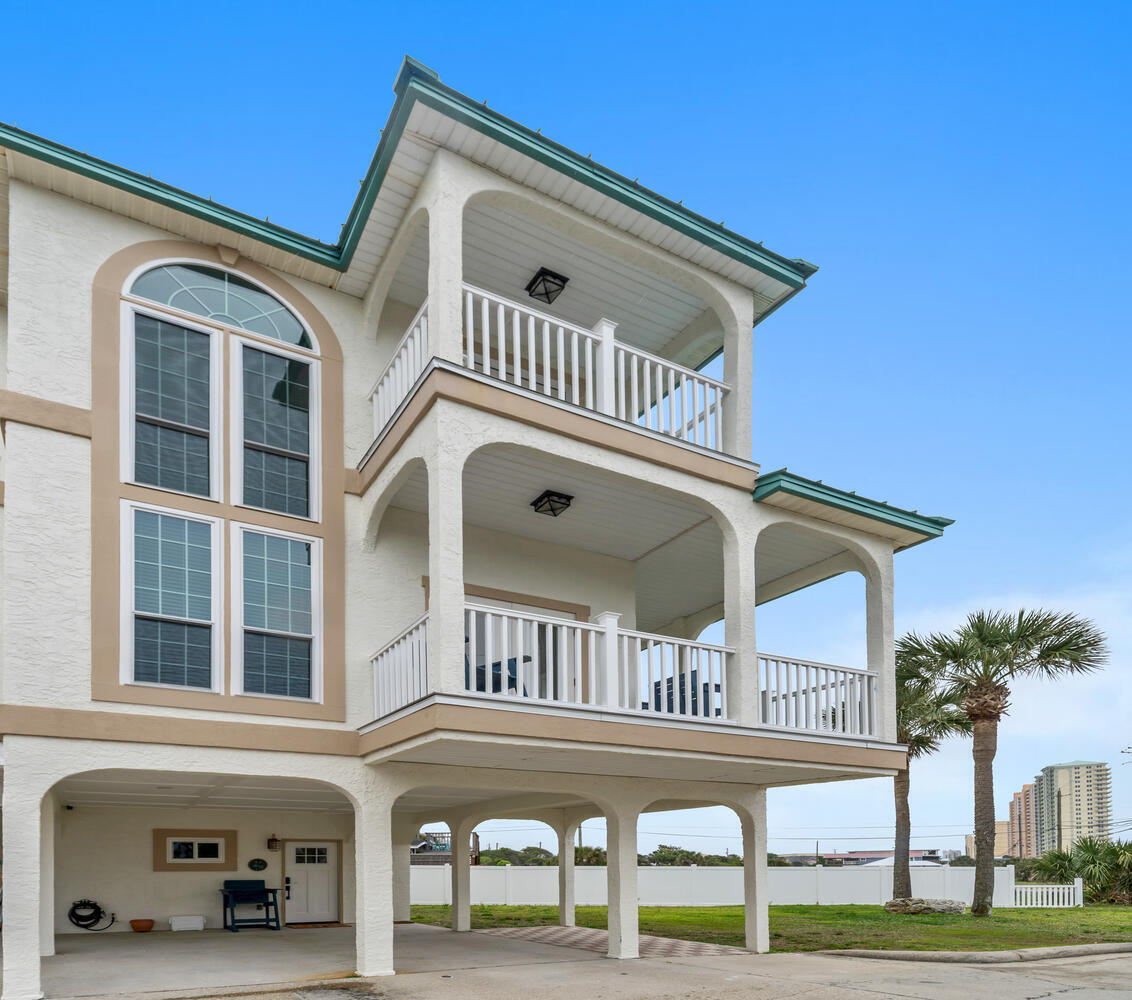 a front view of a house with a balcony