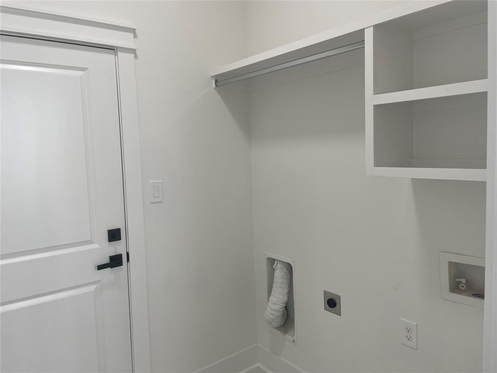 3535 Spring Avenue Dallas, TX 75210 - Photo 17 of 19 Laundry room featuring hookup for an electric dryer and hookup for a washing machine