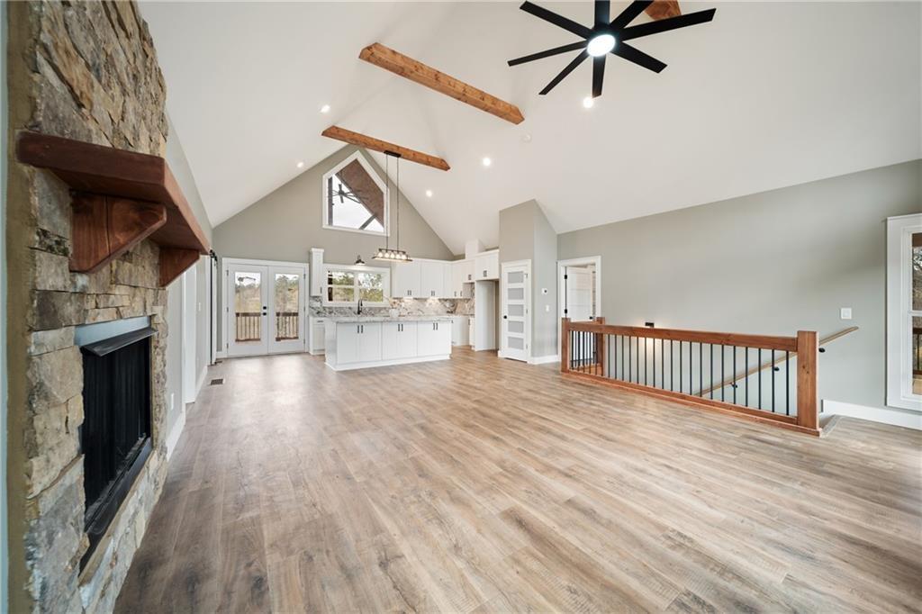 2956 Blalock Mountain Road Talking Rock, GA 30175 - Photo 12 of 63 a view of a living room hardwood flooring and a kitchen