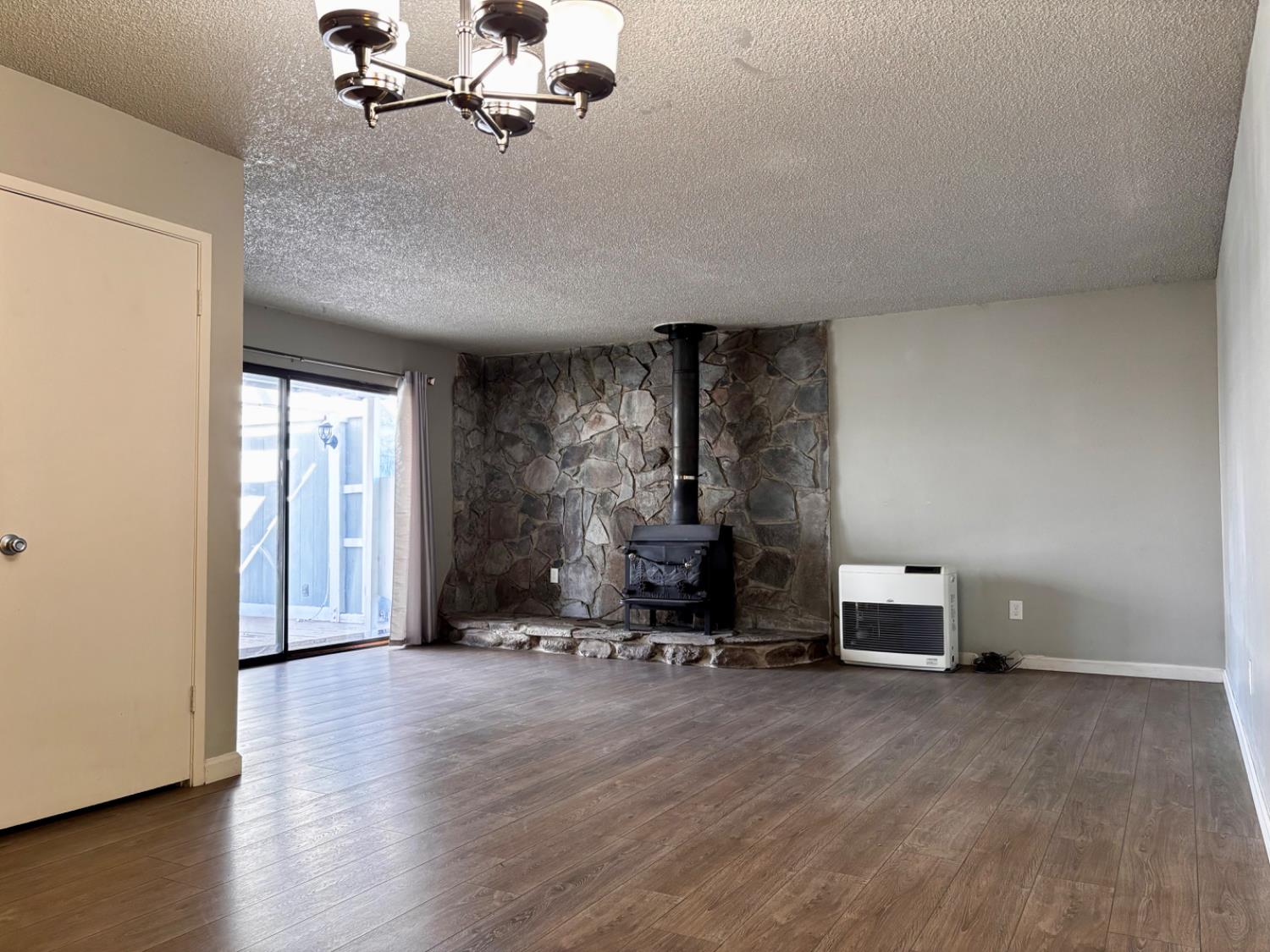 111 Patterson Avenue Loyalton, CA 96118 - Photo 11 of 45 a view of a livingroom with furniture and hardwood floor