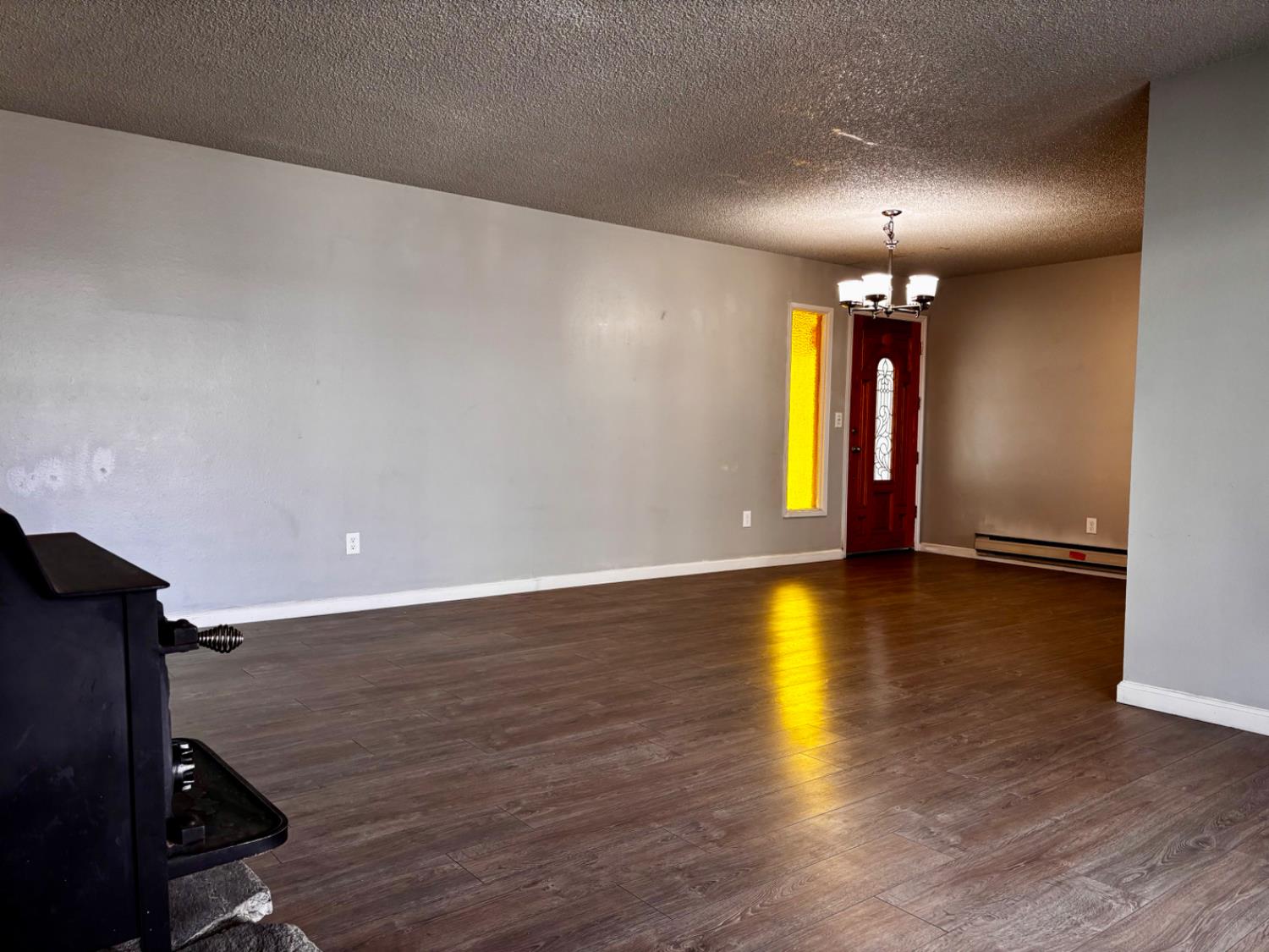 111 Patterson Avenue Loyalton, CA 96118 - Photo 15 of 46 a view of an empty room with wooden floor