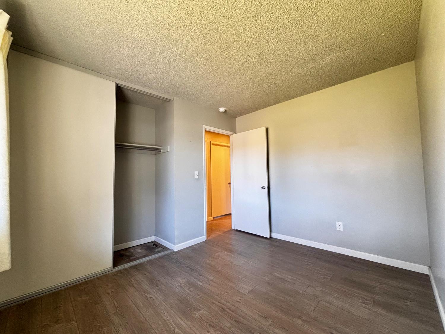 111 Patterson Avenue Loyalton, CA 96118 - Photo 34 of 46 a view of empty room with wooden floor