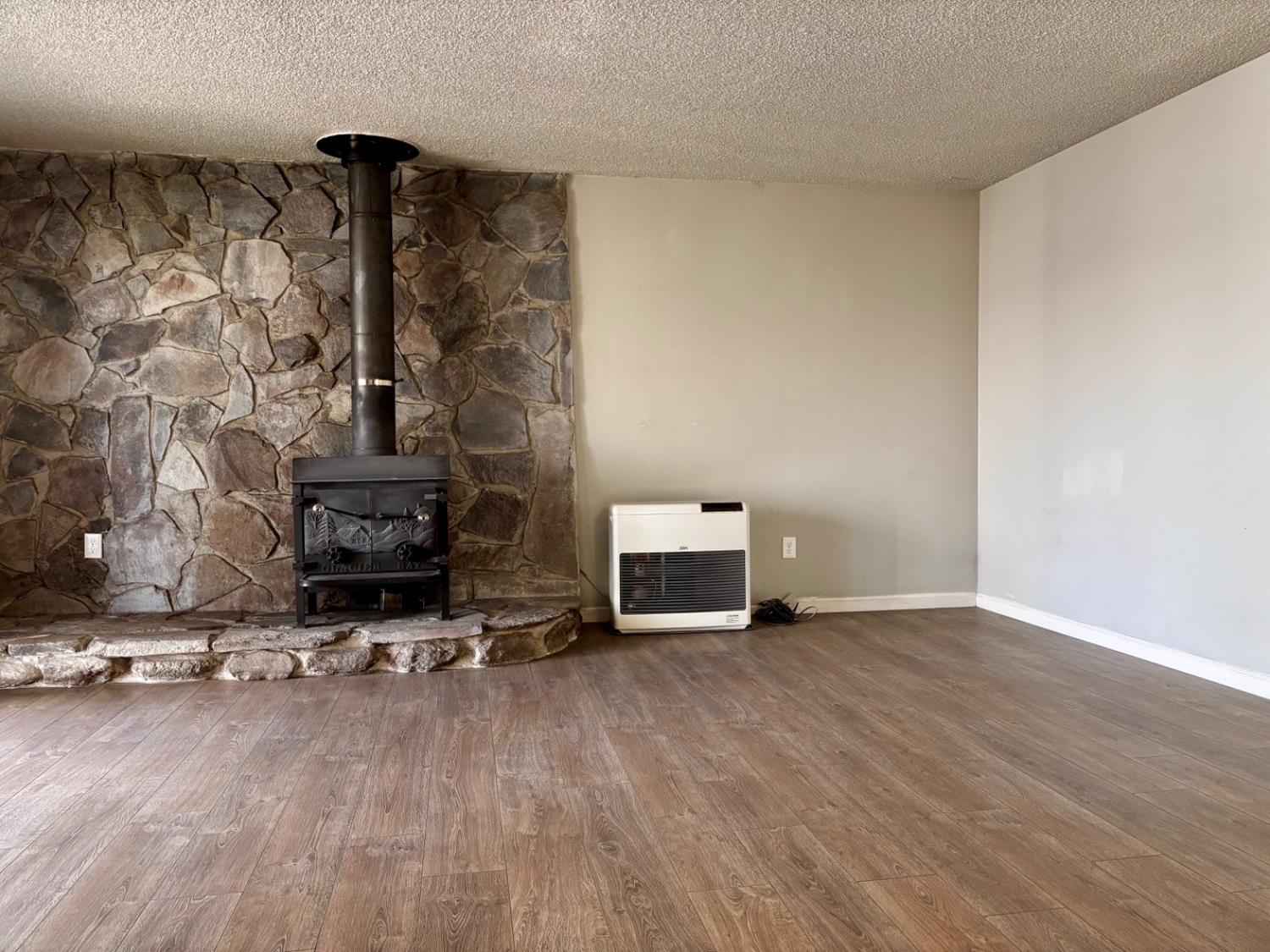 111 Patterson Avenue Loyalton, CA 96118 - Photo 10 of 45 a view of livingroom with furniture and a fireplace