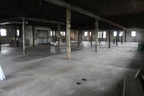 a view of a building with a street