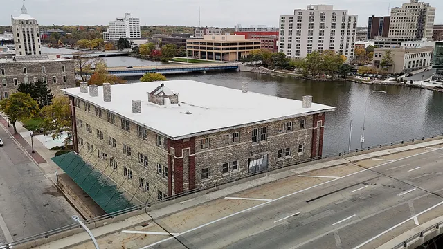 a view of a balcony with chairs