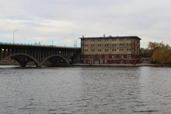a view of a porch with a table and chairs