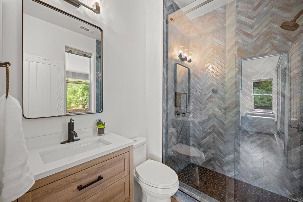 26380 San Felipe Road Warner Springs, CA 92086 - Photo 19 of 69 a bathroom with a sink a toilet and shower