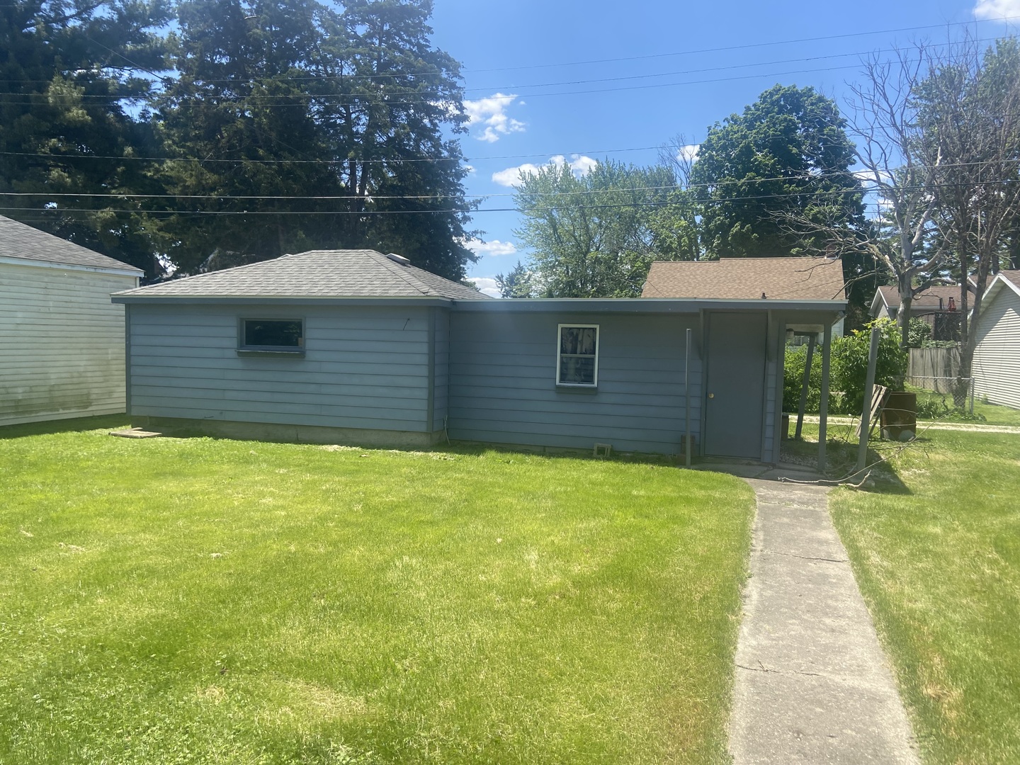 116 North Peru Avenue Ladd, IL 61329 - Photo 4 of 12 a house with a yard