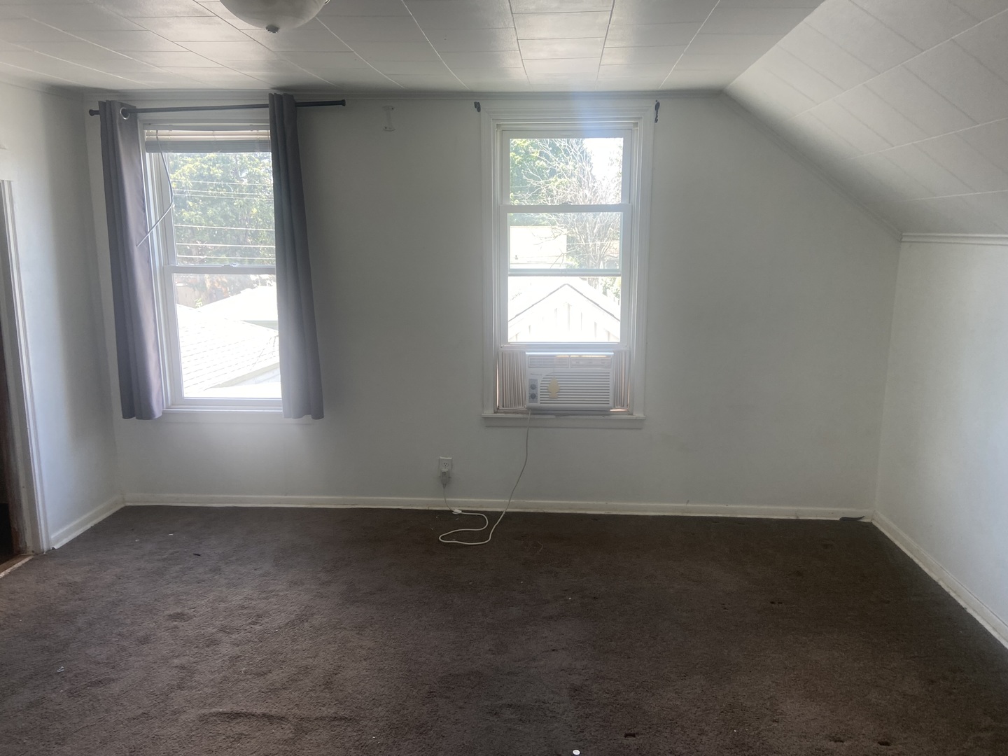 116 North Peru Avenue Ladd, IL 61329 - Photo 7 of 12 an empty room with a window