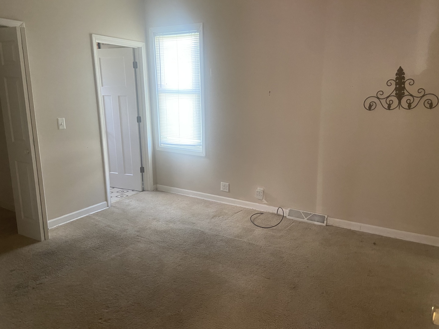 116 North Peru Avenue Ladd, IL 61329 - Photo 9 of 12 an empty room with a window