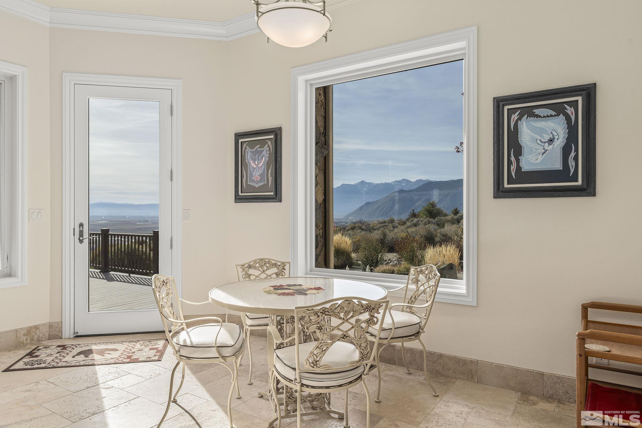 345 James Canyon Loop Genoa, NV 89411 - Photo 22 of 40 a dining room with furniture and window