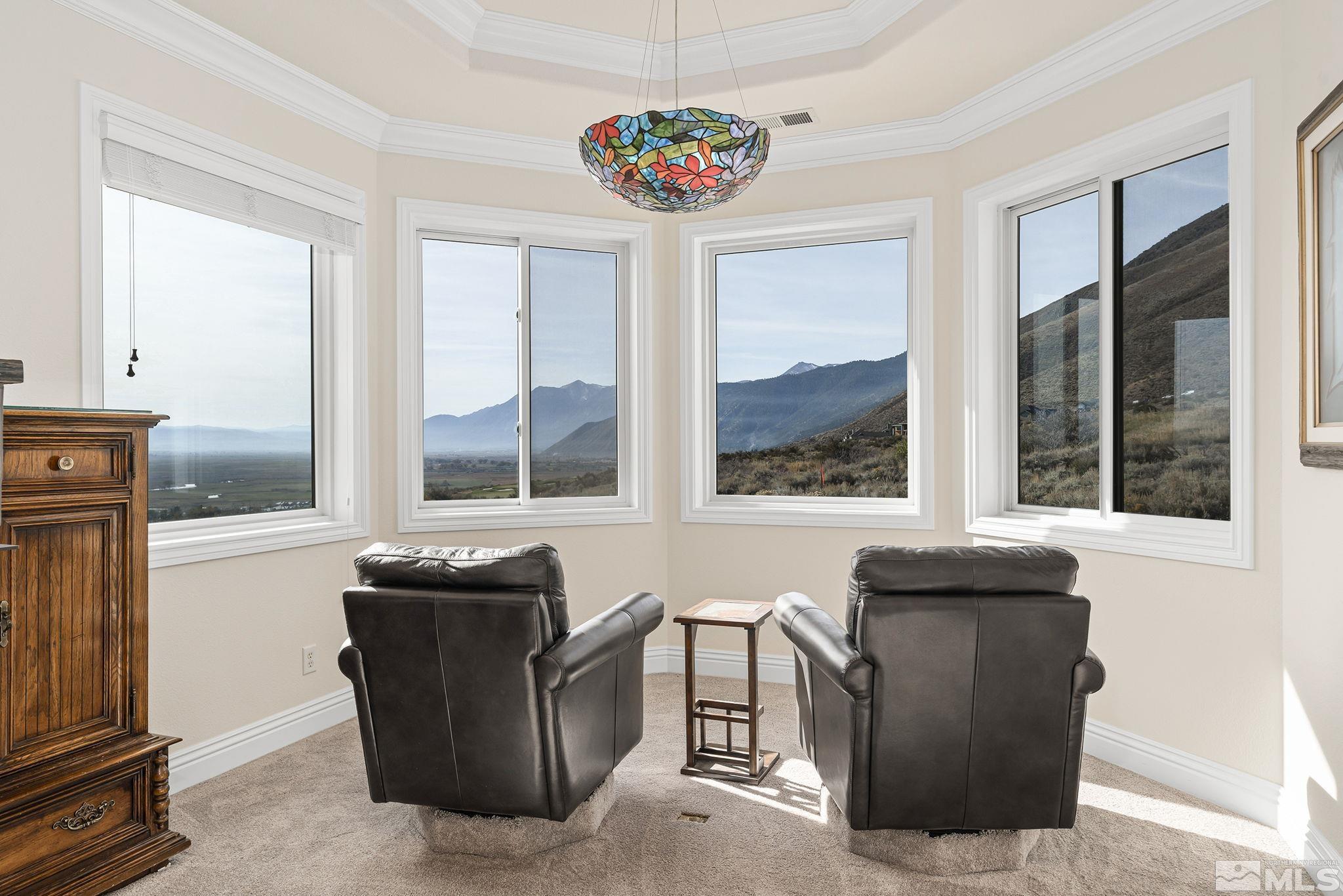345 James Canyon Loop Genoa, NV 89411 - Photo 23 of 40 a living room with furniture and a window