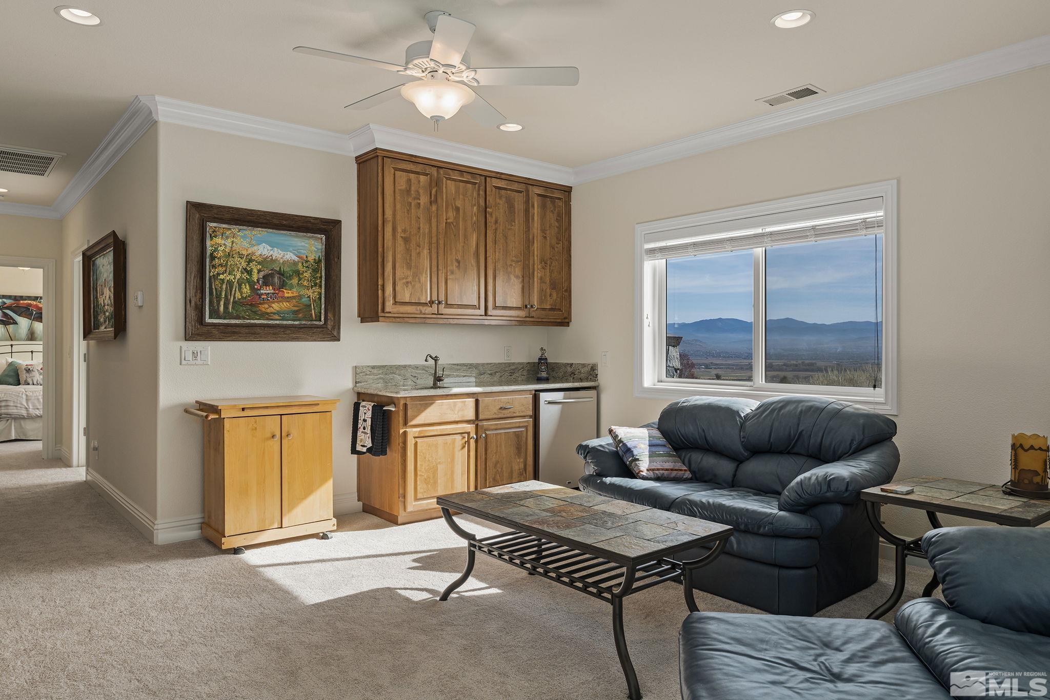 345 James Canyon Loop Genoa, NV 89411 - Photo 30 of 40 a living room with furniture and a window