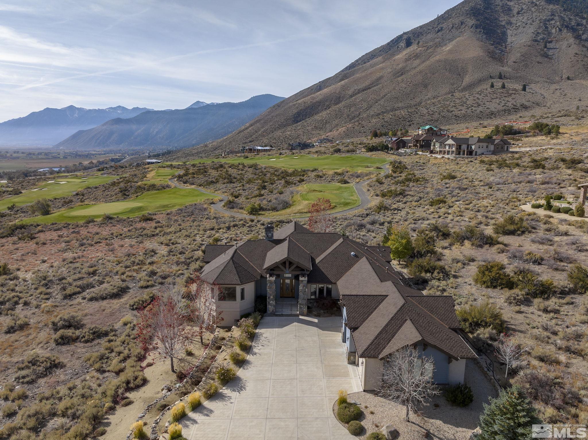 345 James Canyon Loop Genoa, NV 89411 - Photo 37 of 40 a view of a house with a mountain