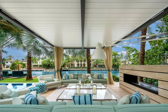 a view of swimming pool with patio