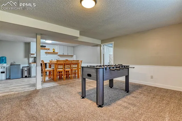 a view of a room with furniture
