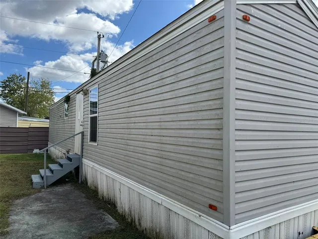 a kitchen with a stove top oven sink and cabinets