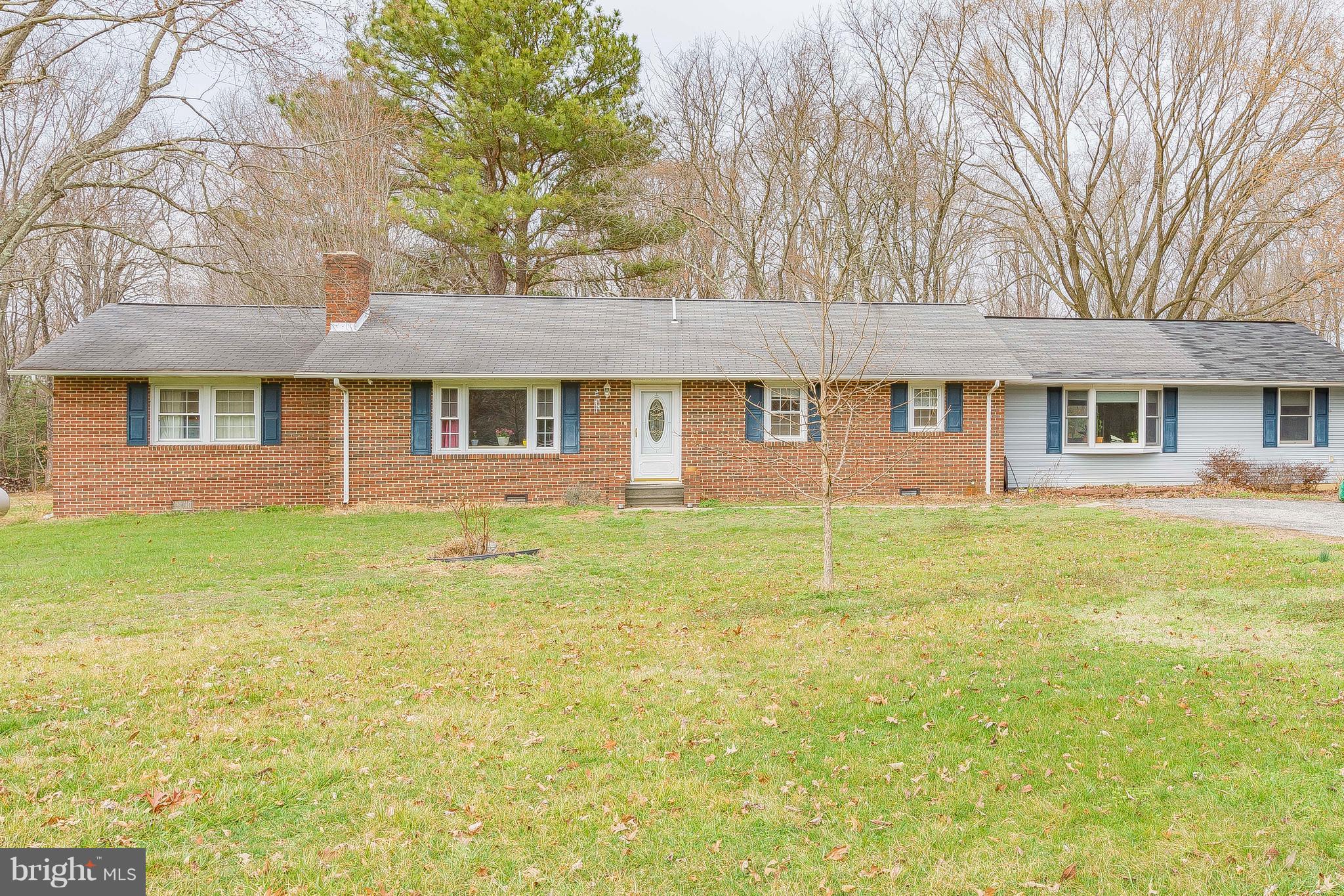 3181 Carroll Road Huntingtown, MD 20639 - Photo 1 of 28 a view of a house with a backyard