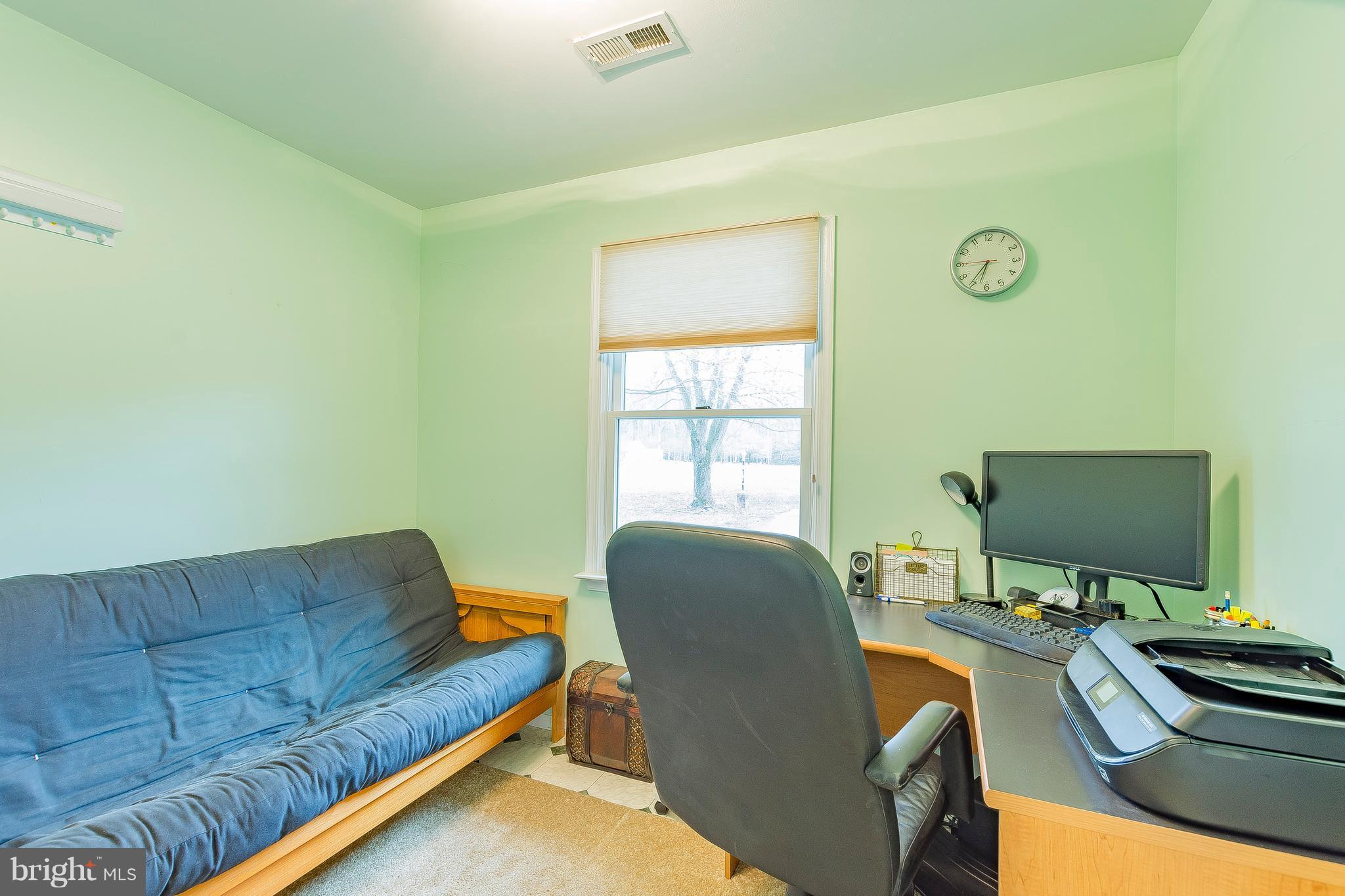 3181 Carroll Road Huntingtown, MD 20639 - Photo 12 of 28 a living room with furniture and a flat screen tv