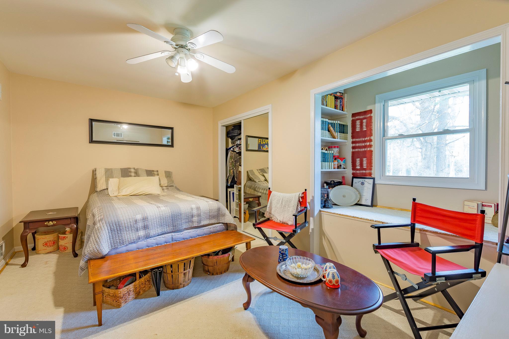 3181 Carroll Road Huntingtown, MD 20639 - Photo 13 of 28 a bedroom with a bed and dresser