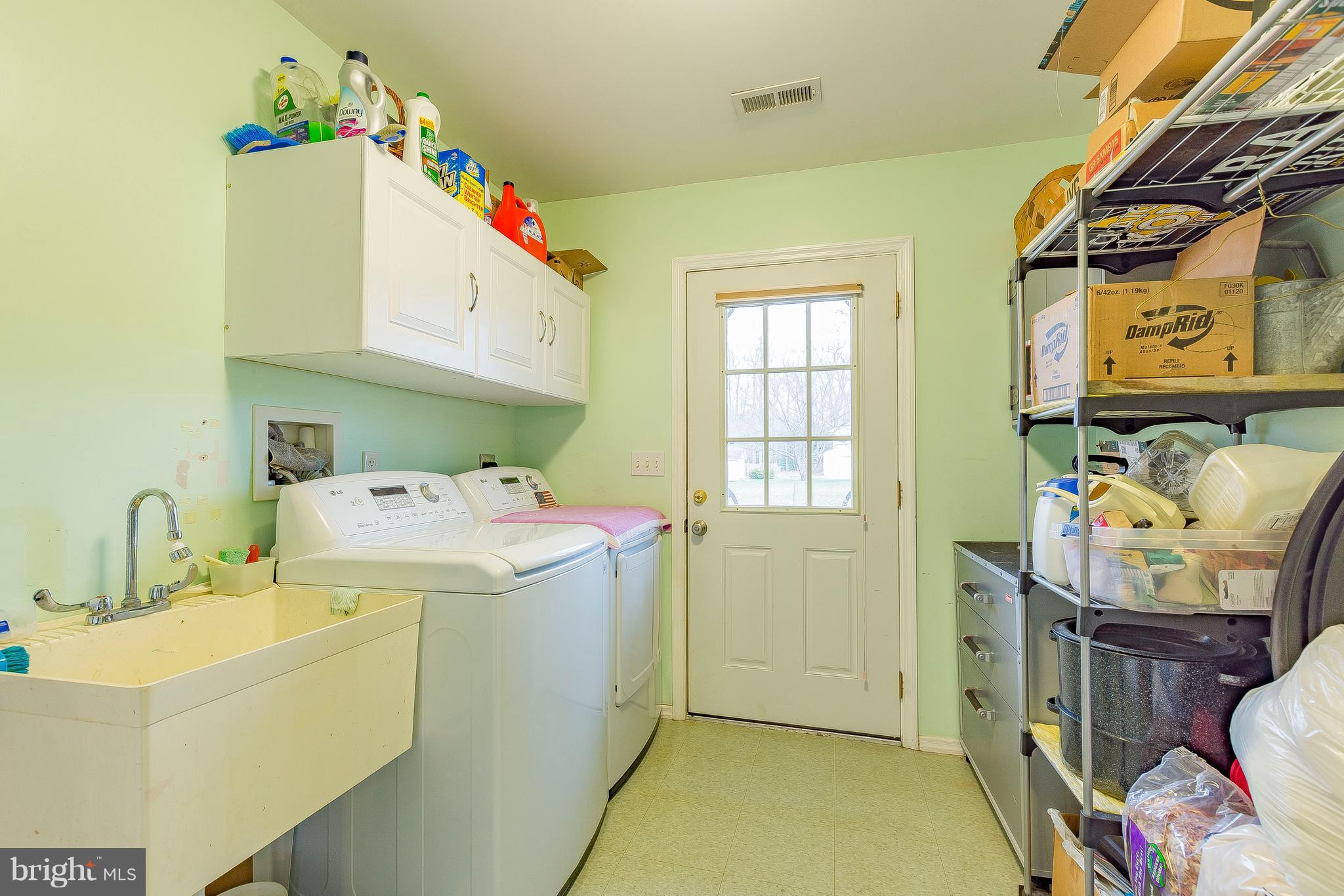 3181 Carroll Road Huntingtown, MD 20639 - Photo 17 of 28 a utility room with dryer and washer
