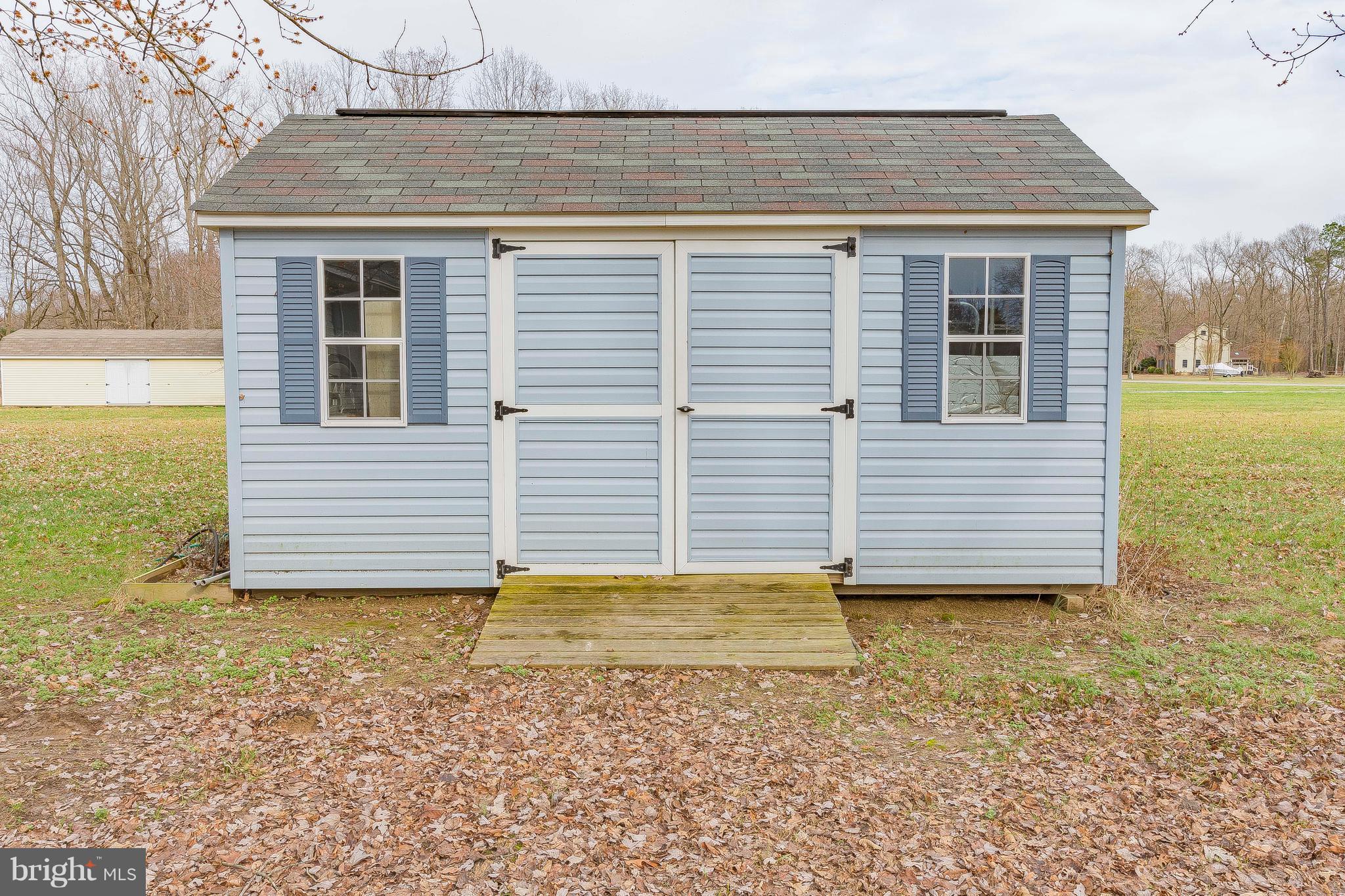 3181 Carroll Road Huntingtown, MD 20639 - Photo 27 of 28 a view of a house with a yard