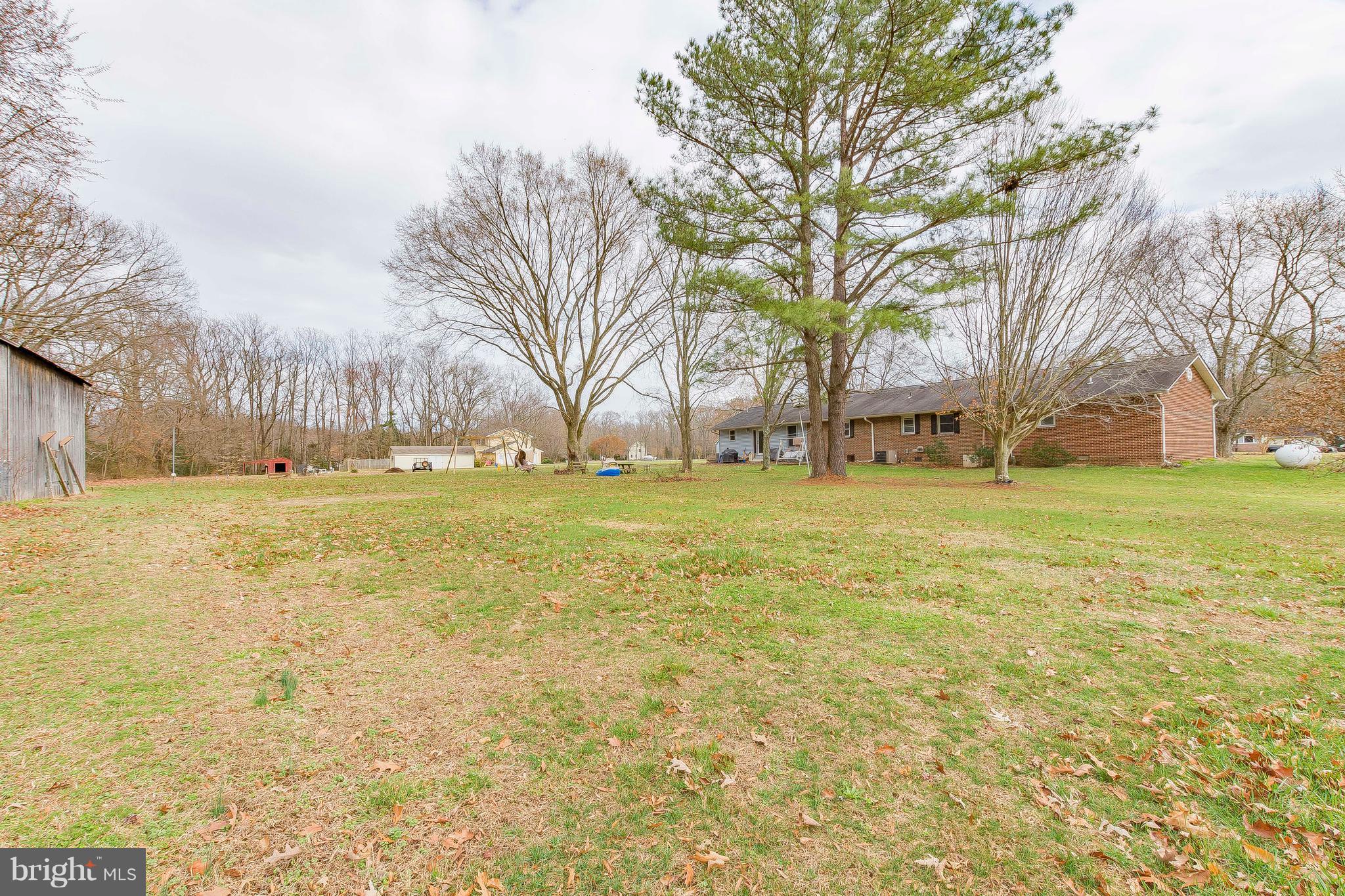 3181 Carroll Road Huntingtown, MD 20639 - Photo 4 of 28 a view of swimming pool with an outdoor space