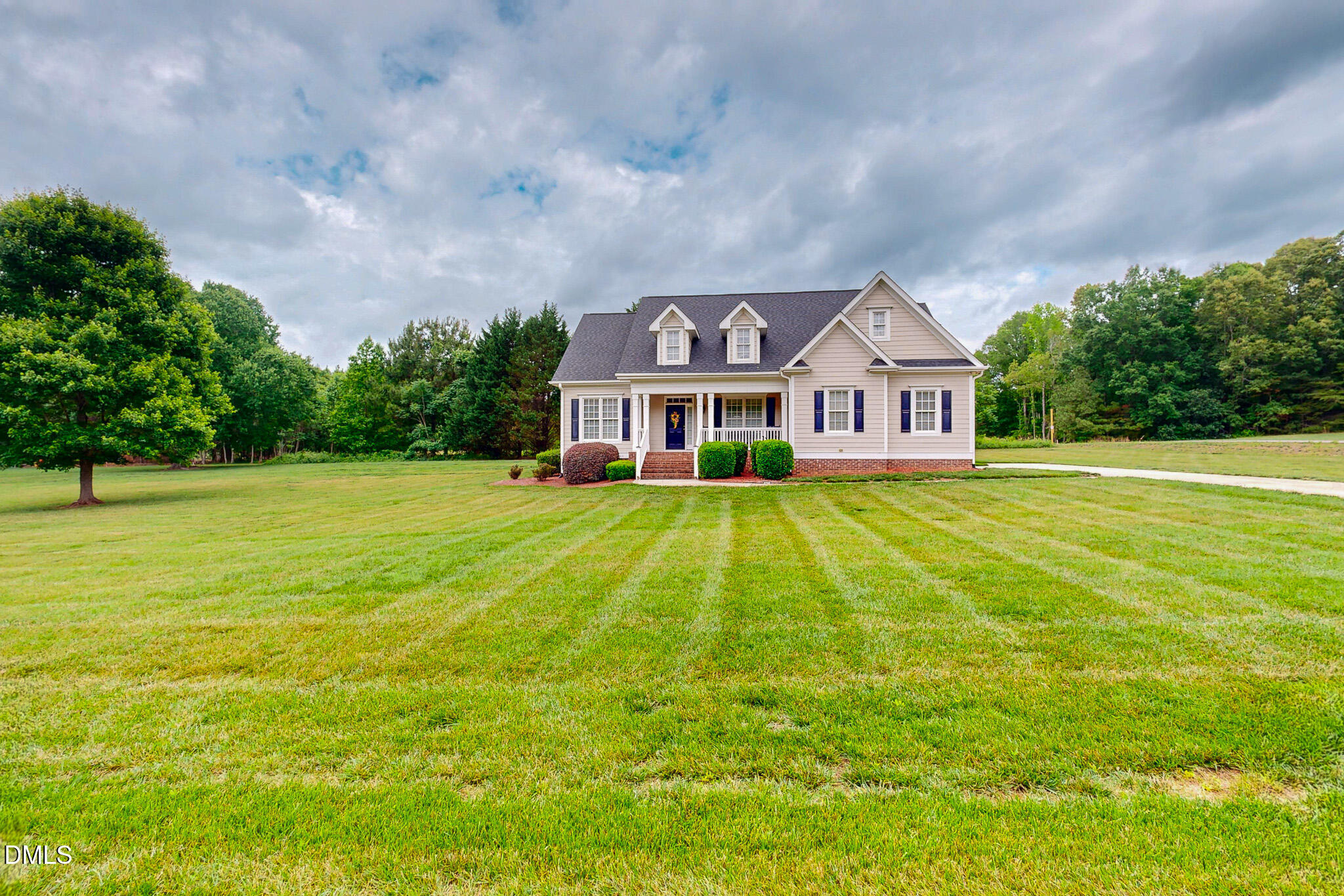 115 Duncan Plantation Road Timberlake, NC 27583 - Photo 21 of 48 a view of a house with a big yard