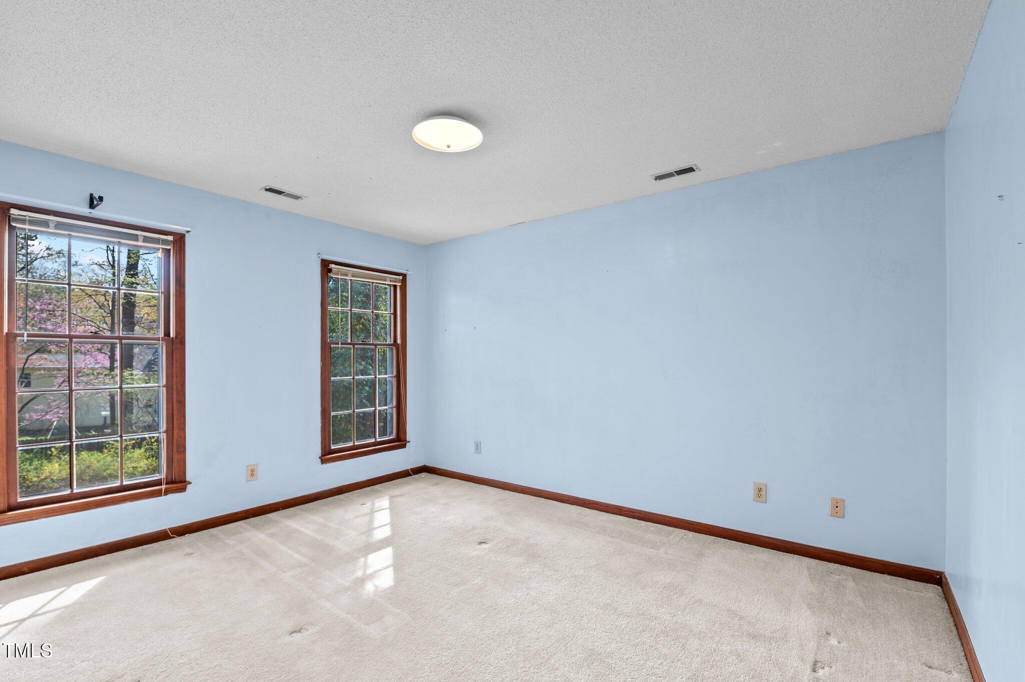 8404 Sleepy Creek Drive Raleigh, NC 27613 - Photo 27 of 39 a view of room with window