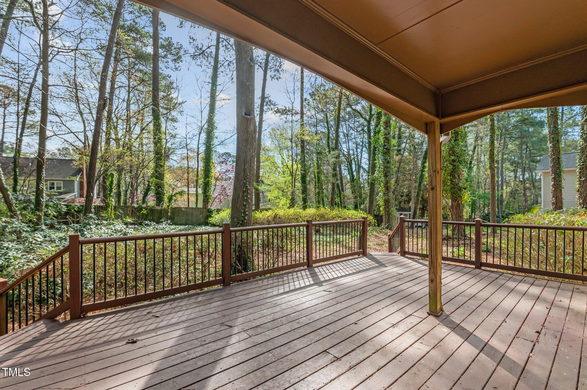 8404 Sleepy Creek Drive Raleigh, NC 27613 - Photo 33 of 39 a view of a balcony with wooden floor