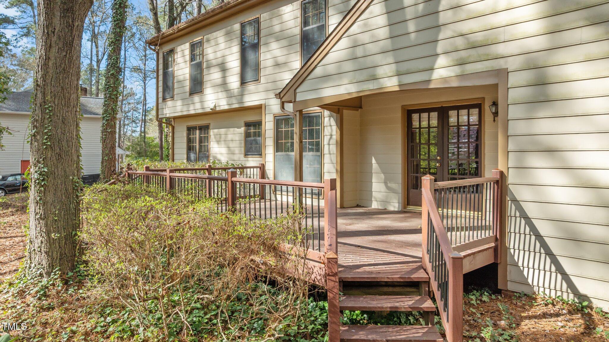 8404 Sleepy Creek Drive Raleigh, NC 27613 - Photo 37 of 39 front view of a house with a large window