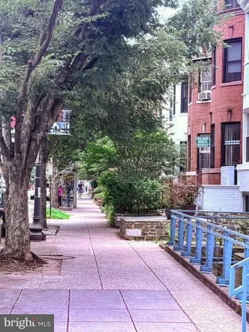 a view of a building with a street