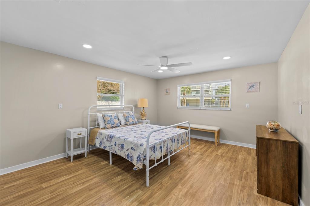 2506 Bay Boulevard Indian Rocks Beach, FL 33785 - Photo 12 of 36 a bedroom with a bed and a desk