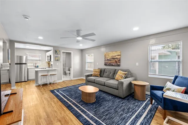 a living room with furniture and a table