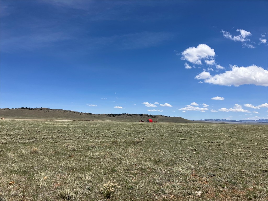View of local wilderness featuring a mountain view and a rural view