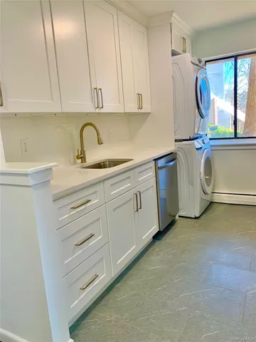 a utility room with cabinets