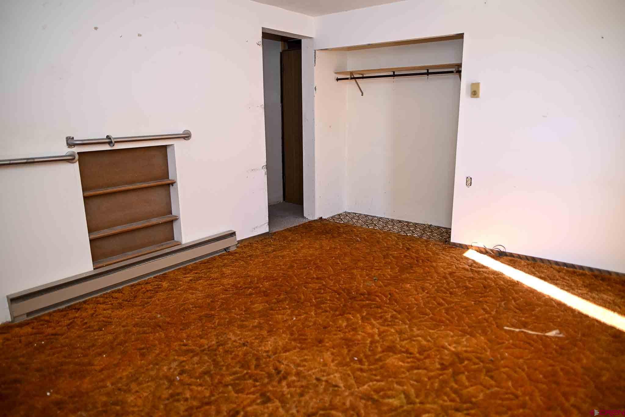 22120 Government Springs Road Montrose, CO 81403 - Photo 23 of 28 a view of an empty room and cabinet