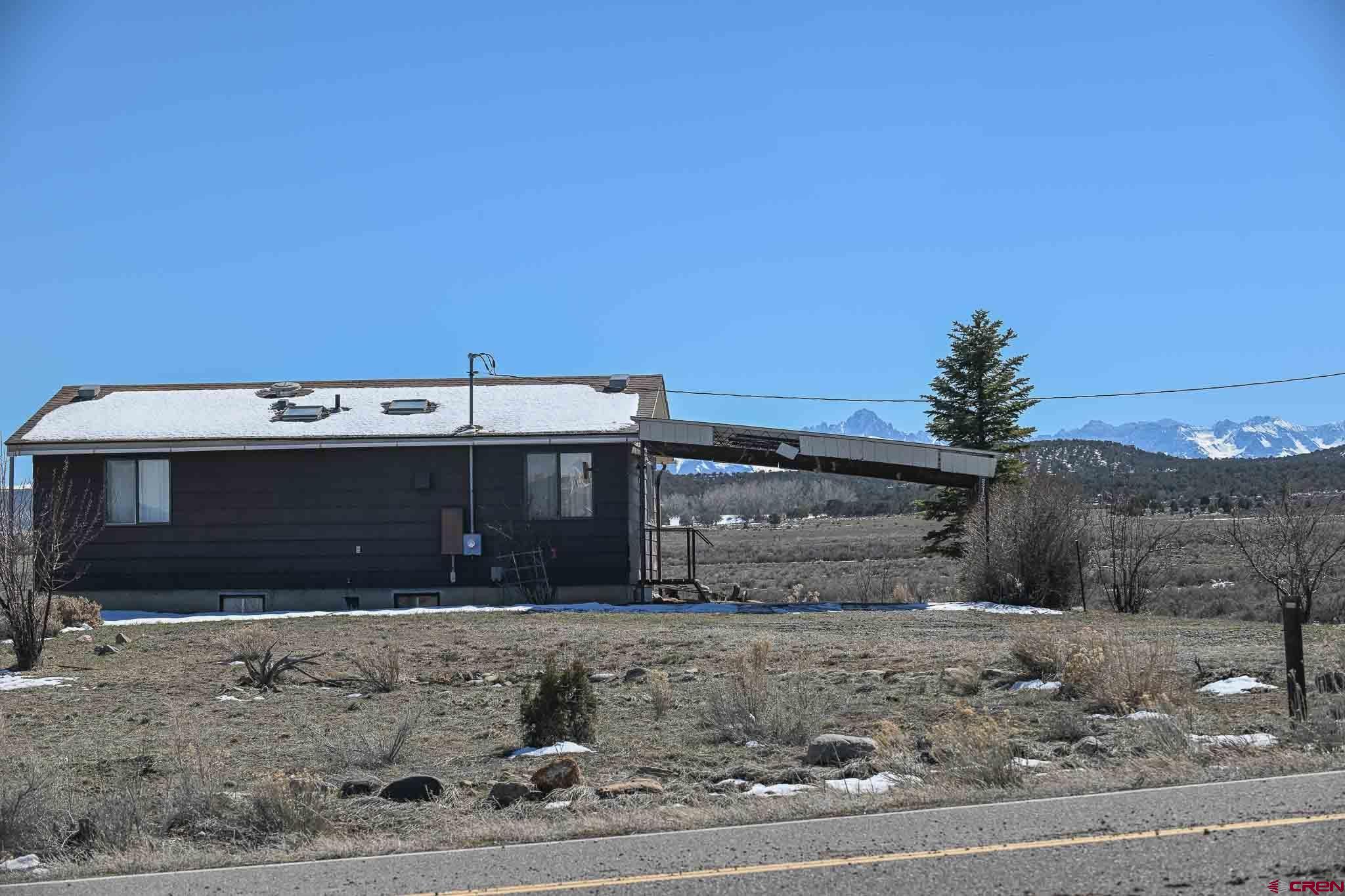 22120 Government Springs Road Montrose, CO 81403 - Photo 9 of 28 a view of a backyard