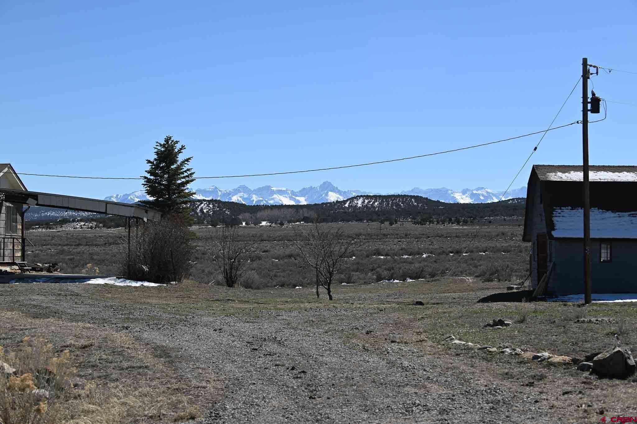 22120 Government Springs Road Montrose, CO 81403 - Photo 10 of 28 a view of a backyard