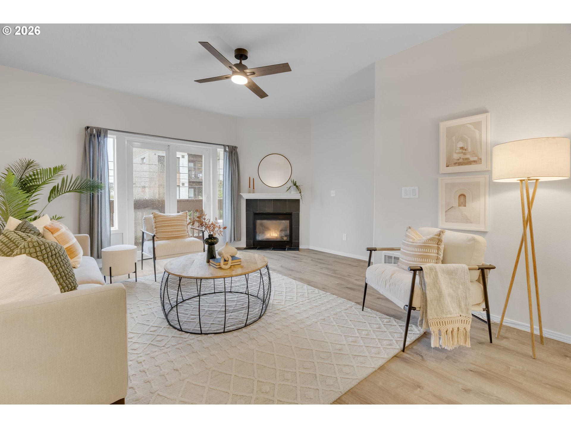 435 Northeast Cook Street Portland, OR 97212 - Photo 13 of 32 a living room with furniture and a fireplace